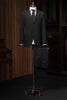 Full view of classic black tailored suit on a mannequin, exemplifying sustainable materials and timeless elegance for formal events.