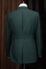 Rear view of the green suit jacket, revealing a structured belt detail that enhances the silhouette, embodying sophistication with eco-conscious design.