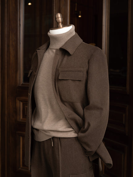 Modern earthy brown jacket with matching tailored cargos. Close up on collar and pocket details, Perfect for high-end formal occasions, crafted 